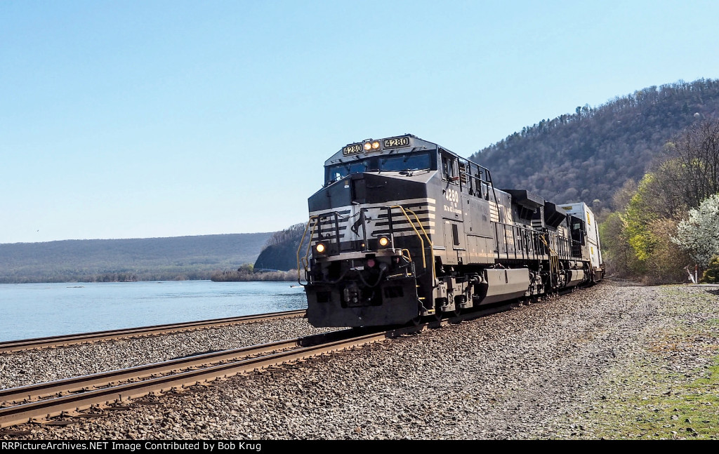 NS westbound stack train followed Amtrak as soon as the block cleared.